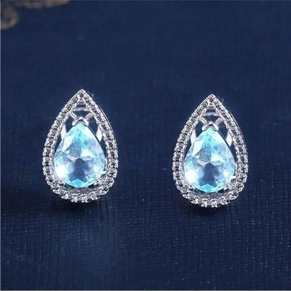 Blue Topaz Tear Drop hinge closure silver earrings